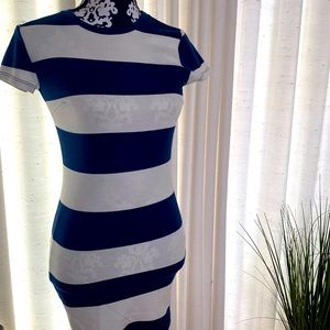 Nautical blue & white striped form fitting dress.